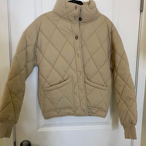 Beige puffy jacket